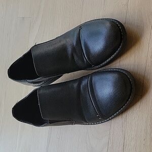 Unlisted brown shoes